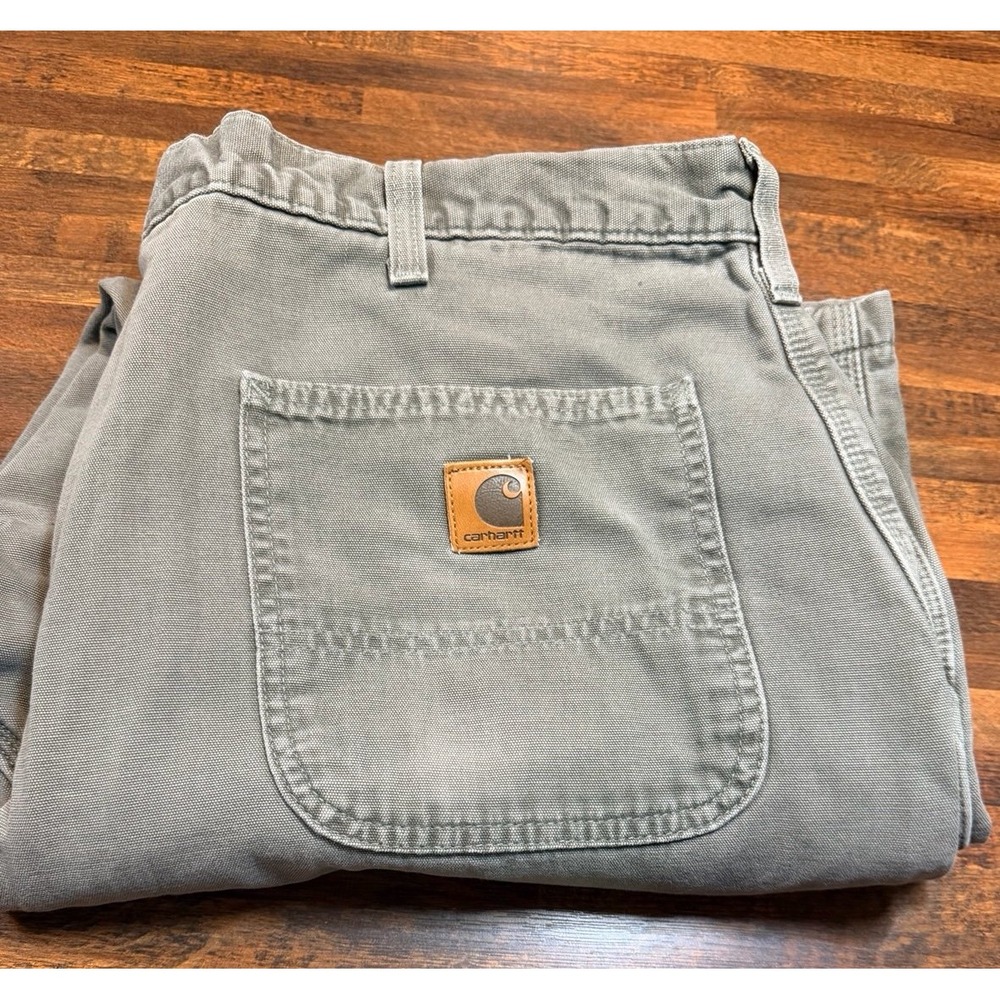 Carhartt army green pants.  Dungaree fit with flannel lining.   Size 42X30.